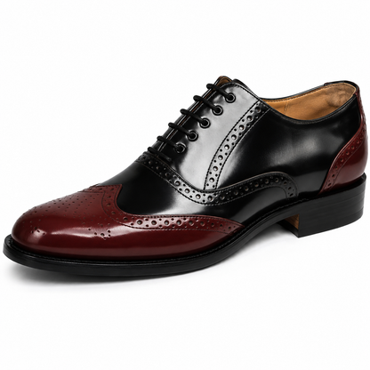 Scarpe Brogue Goodyear Welted: pelle bianca e nera con plantare in memory foam.