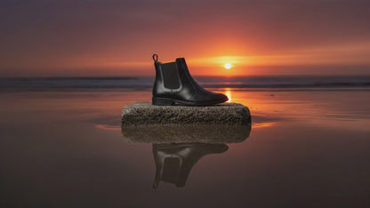 Scarpe con rialzo: Stivali Chelsea in pelle nera con rialzo interno di 3 pollici.